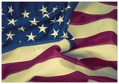 Produktbild von Wallario Premium Glasbild, freischwebende Optik, kräftige Farben, Größe 100 x 70 cm Motiv Amerikanische Flagge im Wind