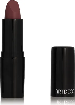 A lipstick and its cap are shown against a white background.
