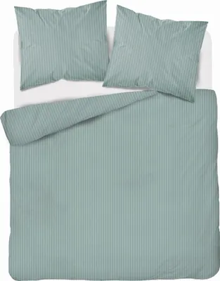 A neatly made bed with mint green striped bedding and two pillows.