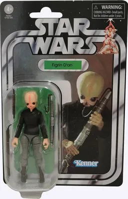 A Star Wars action figure of Figrin D'an in its original packaging.