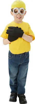 A young boy dressed as a Minion from the movie Despicable Me, standing and posing.