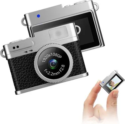 Immagine prodotto di Mini fotocamera digitale retro con fotocamera HD da 12 megapixel, schermo IPS a colori da 0,96 pollici, videoregistratore Full HD 1080p, supporta schede di memoria fino a 128 GB.