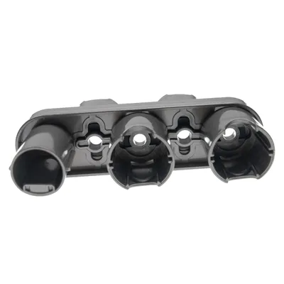 A close-up, angled view of a gray plastic accessory holder for a vacuum cleaner.