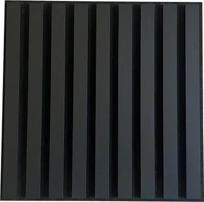 A close-up, front-facing view of a black acoustic panel with vertical slats.