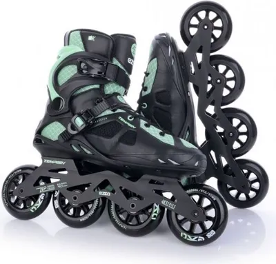 A pair of black and green inline skates are displayed against a white background.