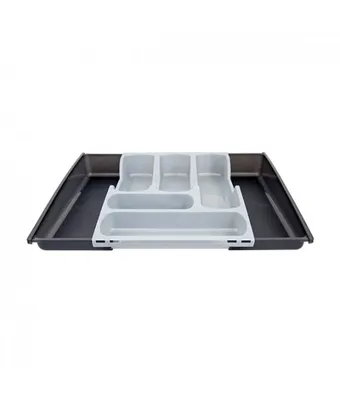 A cutlery organizer inside a drawer.