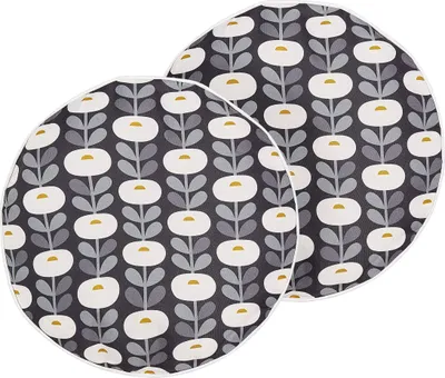 Two round cushions with a floral pattern.