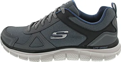 A side view of a gray and blue Skechers athletic shoe.