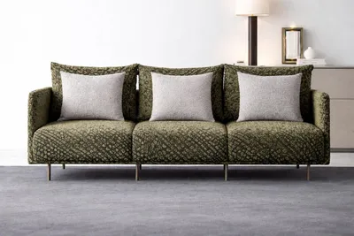 Productafbeelding van Elegant designbank in groen met een structuurpatroon en metalen poten