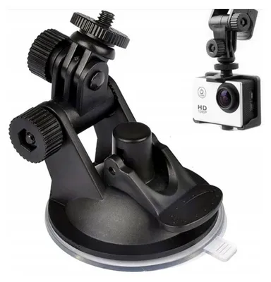 A black suction cup mount for a camera is shown against a white background. A small white camera with 'HD 1080p' text is visible in the upper right corner, attached to a similar mount.