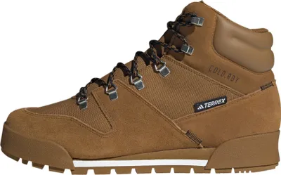 A side view of a brown Adidas Terrex hiking boot against a white background.