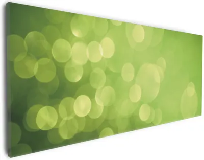 Produktbild von Wallario Premium Leinwandbild Abstrakte grüne Kreise  grüne Lichtpunkte in Größe 30 x 75 cm
