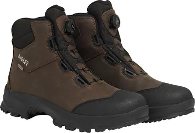 A pair of brown and black hiking boots.