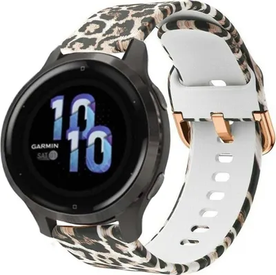A close-up shot of a Garmin Venu 2s smartwatch with a leopard print strap.