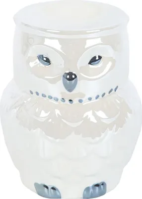 A white iridescent owl-shaped oil burner.