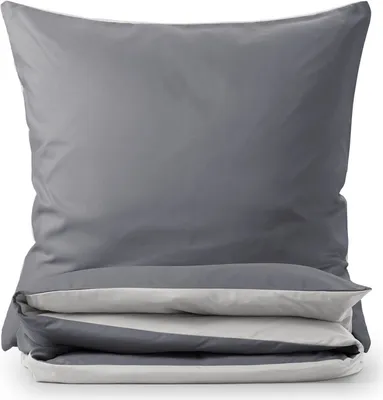 A folded duvet and pillowcase set on a white background.