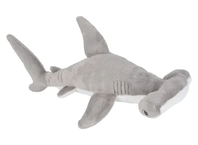 A plush toy hammerhead shark on a white background.
