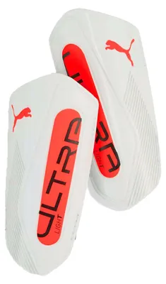 Imagen del producto de Puma - Protectores de tibia para fútbol infantil, modelo PP4732 (Talla L) (Blanco/Naranja)