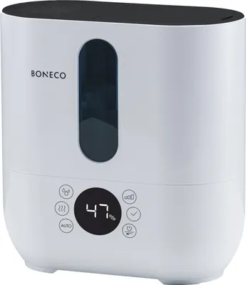 A white humidifier with a black top and a dark gray water level indicator, shown from a front-diagonal angle.