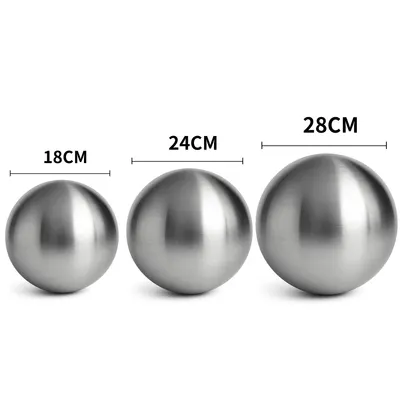 Three stainless steel spheres of different sizes are displayed side-by-side on a white background.