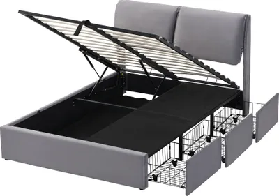 A grey upholstered bed frame with the mattress support lifted to reveal storage space and drawers underneath.