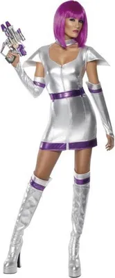 A woman wearing a futuristic silver and purple spacegirl costume, holding a ray gun.
