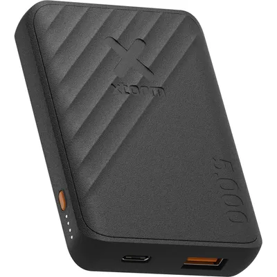 A black power bank with textured surface and orange accents.