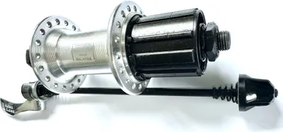 Zdjęcie produktu dla Piasta tylna Shimano FH-RM40 z 36 otworami i 7 przełożeniami, srebrna