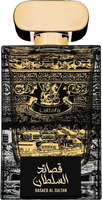 A perfume bottle with ornate gold and black detailing.