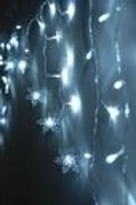 Produktbild von LED Schneeflocken Lichtervorhang 71 LEDs kaltweiß Batteriebetrieb