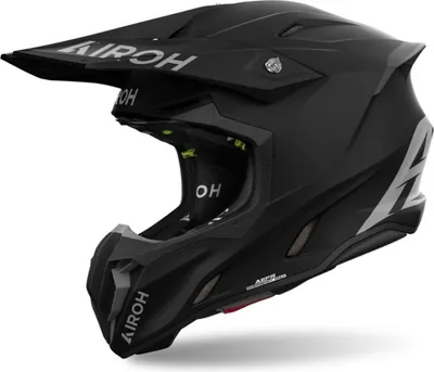 A black Airoh Twist 3 Solid Motocross Helmet on a white background.