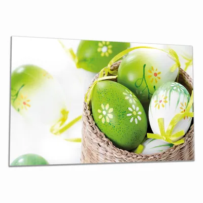 Produktbild von Wallario Herdabdeckplatte aus Glas, Größe 90 x 52 cm 1-teilig, Motiv Ostergruß - bunte bemalte Ostereier in einem kleinen Körbchen