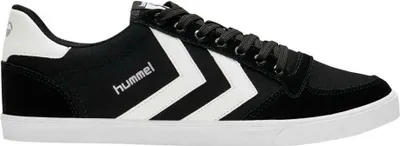 A side view of a single black and white sneaker.