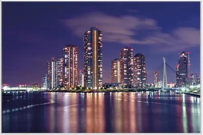 Produktbild von Wallario Wandbild Tokyo- Skyline bei Nacht, Größe: 61 x 91,50 cm, Poster mit weißem Aluminiumrahmen