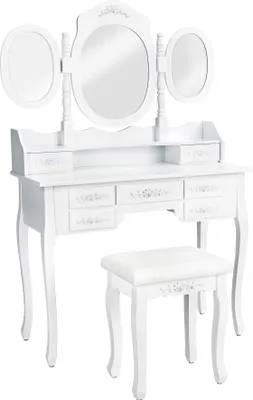 A white vanity table with a triple mirror and a matching stool against a white background.