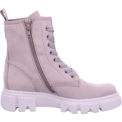 A side view of a beige lace-up boot with a white sole, set against a white background.