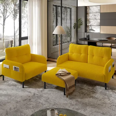 A yellow sofa set with an armchair and ottoman in a modern living room.