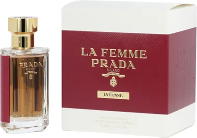 A perfume bottle and its packaging are displayed side-by-side against a white background.