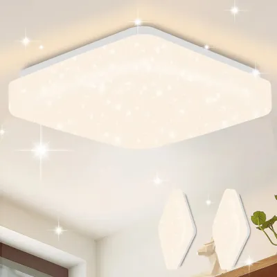 A square ceiling light with a star-like pattern is shown mounted on a white ceiling. Two smaller, diamond-shaped lights are visible on a shelf below.