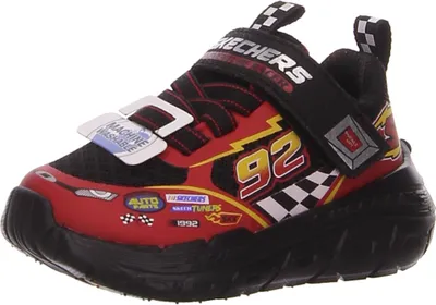 A single child's sneaker with a race car theme.