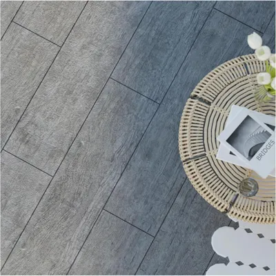 Produktbild von Terrassenplatte in Grau aus Feinsteinzeug Komplettset mit Verlegehilfe für Terrasse, Balkon und Garten