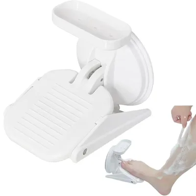 A white shower footrest is shown, with a smaller inset image showing a person using it to shave their leg in the shower.
