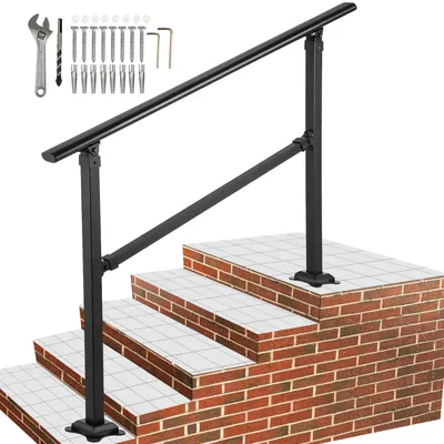A black metal handrail for stairs, shown installed on a brick staircase with tiled steps.