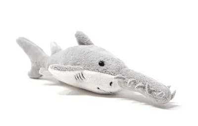 A plush toy sawfish is displayed against a white background.