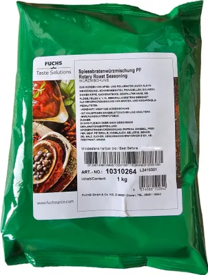 A green plastic bag containing seasoning, with a label showing product details and an image of ingredients.