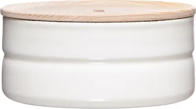 A white ceramic canister with a wooden lid.