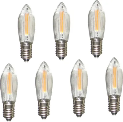 Seven LED filament bulbs arranged in two rows on a white background.