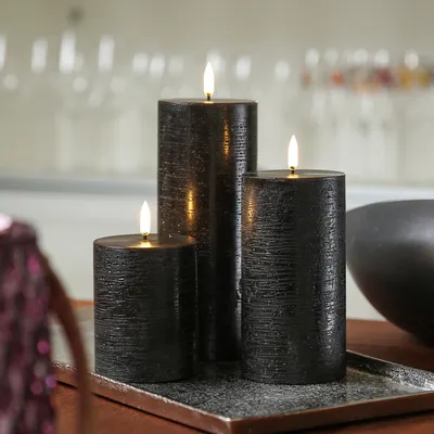 Produktbild von LED Kerzenset PIA - Rustik-Optik - 3 Größen - inkl. Batterien und Fernbedienung - schwarz - 3er Set