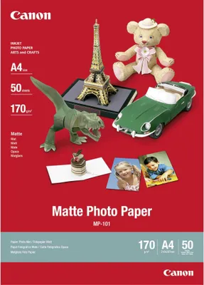 A collection of paper crafts and photos displayed on a red background, advertising Canon Matte Photo Paper.