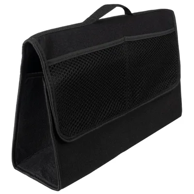 A black felt trunk organizer with mesh pockets.